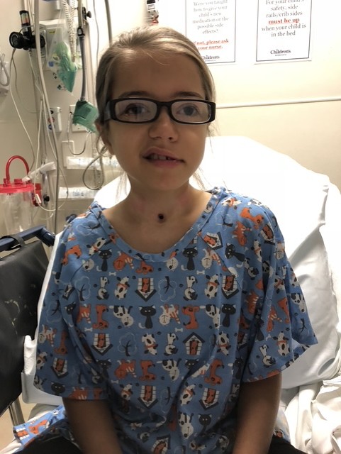 Anikah in her hospital room post tracheotomy
