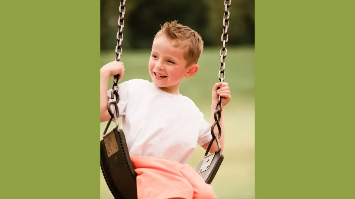 Nathan on a swing