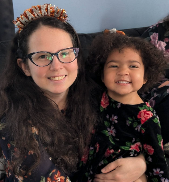 Liz holding her daughter Isabelle