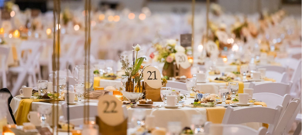 Rows of tables set up to welcome gala attendees